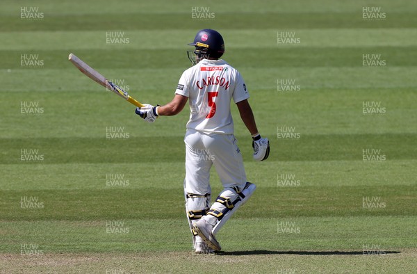 230525 - Glamorgan v Middlesex - Rothesay County Championship, Division Two - Kiran Carlson of Glamorgan acknowledges his half century