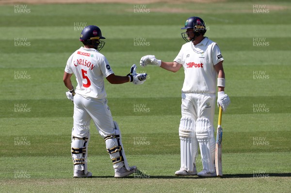 230525 - Glamorgan v Middlesex - Rothesay County Championship, Division Two - Kiran Carlson of Glamorgan acknowledges his half century