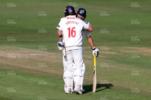 230525 - Glamorgan v Middlesex - Rothesay County Championship, Division Two - Sam Northeast of Glamorgan celebrates scoring a century with Kiran Carlson