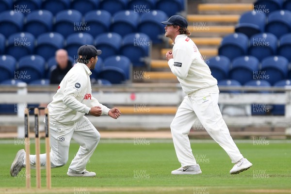 240525 - Glamorgan v Middlesex - Rothesay County Championship - Sam Robson of Middlesex is caught out by Sam Northeast of Glamorgan from the bowling of Timm Van Der Gugten