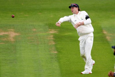 250525 - Glamorgan v Middlesex - Rothesay County Championship - Tom Bevan of Glamorgan throws the ball