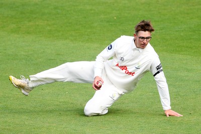 250525 - Glamorgan v Middlesex - Rothesay County Championship - Asa Tribe of Glamorgan catches the ball