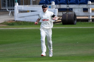 250525 - Glamorgan v Middlesex - Rothesay County Championship - James Harris of Glamorgan celebrates after catching the ball to dismiss Jack Davies of Middlesex