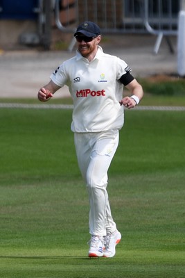 250525 - Glamorgan v Middlesex - Rothesay County Championship - James Harris of Glamorgan celebrates after catching the ball to dismiss Jack Davies of Middlesex
