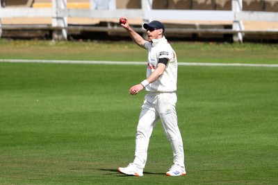 250525 - Glamorgan v Middlesex - Rothesay County Championship - James Harris of Glamorgan celebrates catching the ball to dismiss Toby Roland-Jones of Middlesex