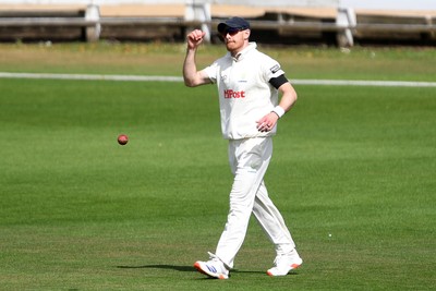 250525 - Glamorgan v Middlesex - Rothesay County Championship - James Harris of Glamorgan celebrates catching the ball to dismiss Toby Roland-Jones of Middlesex