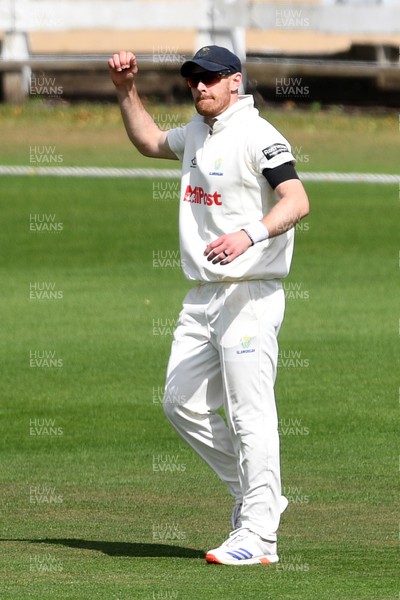 250525 - Glamorgan v Middlesex - Rothesay County Championship - James Harris of Glamorgan celebrates catching the ball to dismiss Toby Roland-Jones of Middlesex