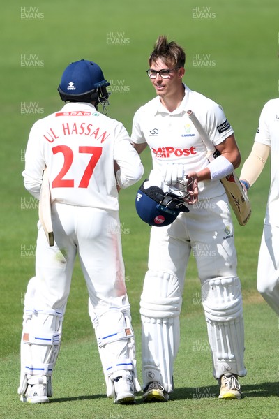 250525 - Glamorgan v Middlesex - Rothesay County Championship - Zain Ul-Hassan and Asa Tribe of Glamorgan at the end of the match