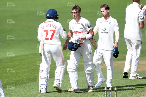 250525 - Glamorgan v Middlesex - Rothesay County Championship - Zain Ul-Hassan and Asa Tribe of Glamorgan at the end of the match
