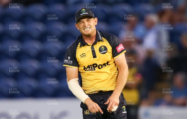 260719 - Glamorgan v Middlesex, Vitality Blast - Graham Wagg of Glamorgan winces after just getting his fingers to the ball from Max Holden of Middlesex, but unable to take the catch