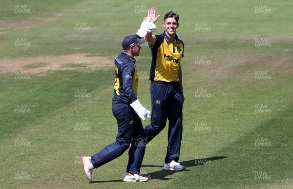 040719 - Glamorgan Cricket v Netherlands - T20 Friendly - Roman Walker celebrates with Tom Cullen of Glamorgan