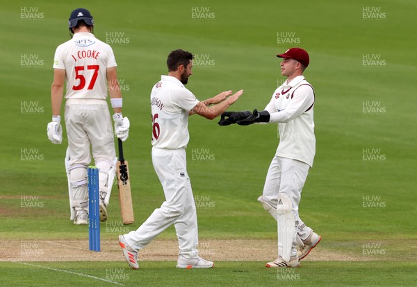 120721 - Glamorgan v Northamptonshire - LV= County Championship - Ben Sanderson celebrates with Harry Gouldstone after Joe Cooke is caught by Ricardo Vasconcelos