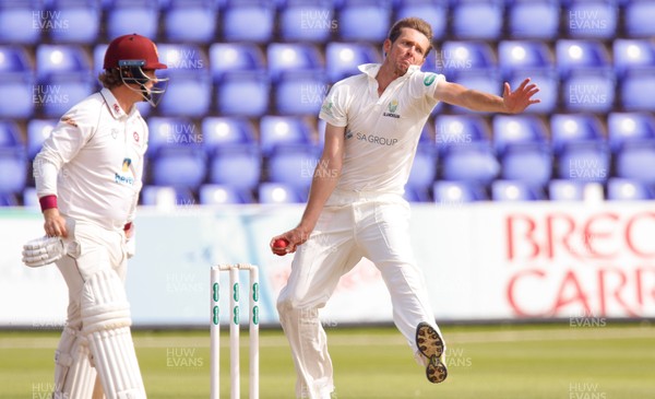 130917 - Glamorgan v Northamptonshire, Specsavers County Championship, Division 2 - Michael Hogan of Glamorgan bowls during the second day