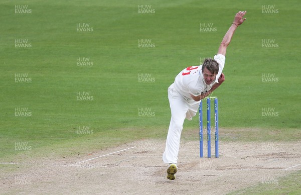 140721 - Glamorgan v Northamptonshire, LV= County Championship - Michael Hogan of Glamorgan bowls