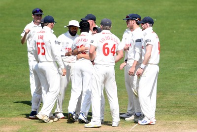 180525 - Glamorgan v Northamptonshire - Rothesay County Championship - Chris Cooke of Glamorgan celebrates with team mates after he catches the ball to dismiss Luke Procter of Northamptonshire