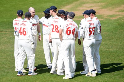 180525 - Glamorgan v Northamptonshire - Rothesay County Championship - James Harris of Glamorgan celebrates with team mates after he bowls the ball to dismiss Saif Zaib of Northamptonshire