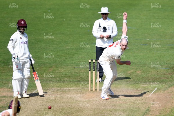 180525 - Glamorgan v Northamptonshire - Rothesay County Championship - James Harris of Glamorgan bowls the ball to dismiss Saif Zaib of Northamptonshire