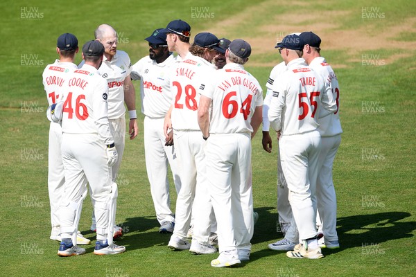 180525 - Glamorgan v Northamptonshire - Rothesay County Championship - James Harris of Glamorgan celebrates with team mates after he bowls the ball to dismiss Saif Zaib of Northamptonshire