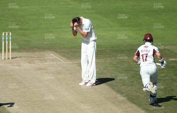 260618 - Glamorgan v Northamptonshire, Specsavers County Championship Div 2 - Michael Hogan of Glamorgan reacts after missing the chance to take the wicket of Ben Duckett of Northamptonshire