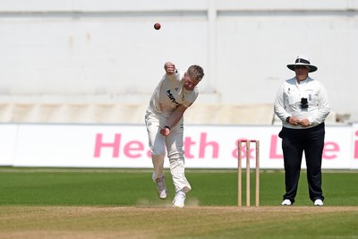 260624 - Glamorgan v Northamptonshire  - Vitality County Championship, Division 2 - Timm Van Der Gugten of Glamorgan bowling