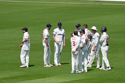 260624 - Glamorgan v Northamptonshire  - Vitality County Championship, Division 2 - Harry Podmore of glamorgan celebrates with teammates after taking the wicket of Justin Broad of Northamptonshire