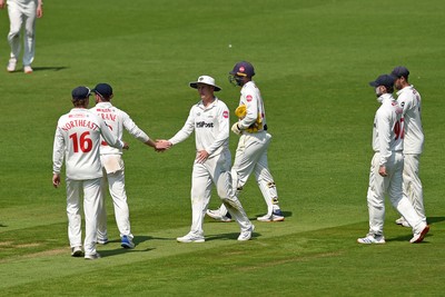 260624 - Glamorgan v Northamptonshire  - Vitality County Championship, Division 2 - Marnus Labuschange of Glamorgan celebrates with teammates after taking the wicket of Liam Patterson-White of Northamptonshire