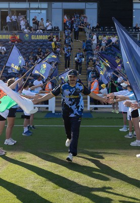 080726 - Glamorgan v Northamptonshire Steelbacks, Vitality Blast Men - Kiran Carlson of Glamorgan leads his team out
