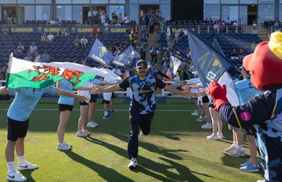 080726 - Glamorgan v Northamptonshire Steelbacks, Vitality Blast Men - Kiran Carlson of Glamorgan leads his team out