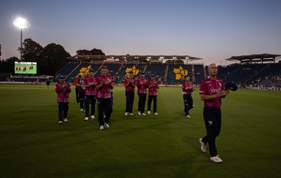 080726 - Glamorgan v Northamptonshire Steelbacks, Vitality Blast Men - The Steelbacks are led off the pitch by Chris Lynn after winning the match