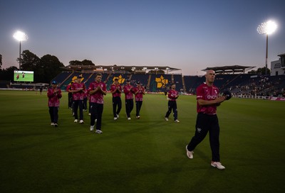 080726 - Glamorgan v Northamptonshire Steelbacks, Vitality Blast Men - The Steelbacks are led off the pitch by Chris Lynn after winning the match