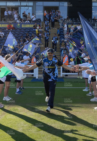 080726 - Glamorgan v Northamptonshire Steelbacks, Vitality Blast Men - Kiran Carlson of Glamorgan leads his team out