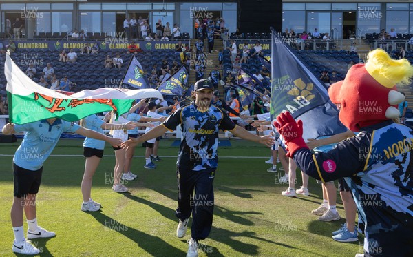 080726 - Glamorgan v Northamptonshire Steelbacks, Vitality Blast Men - Kiran Carlson of Glamorgan leads his team out