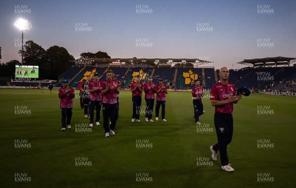 080726 - Glamorgan v Northamptonshire Steelbacks, Vitality Blast Men - The Steelbacks are led off the pitch by Chris Lynn after winning the match