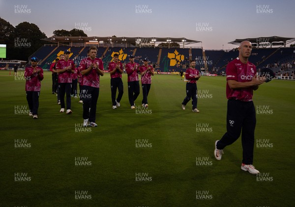080726 - Glamorgan v Northamptonshire Steelbacks, Vitality Blast Men - The Steelbacks are led off the pitch by Chris Lynn after winning the match