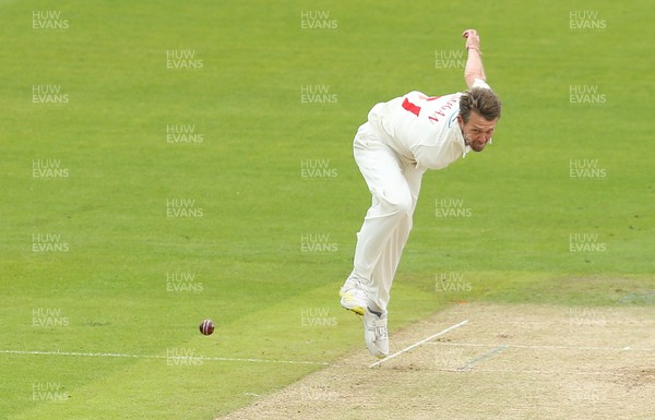 110721 - Glamorgan v Northamptonshire, LV County Championship - Michael Hogan of Glamorgan bowls to Emilio Gay of Northamptonshire