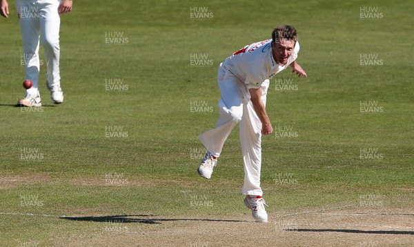 130419 - Glamorgan Cricket v Northamptonshire - Specsavers County Championship Division Two - Michael Hogan of Glamorgan bowling