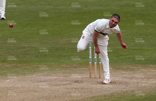 140419 - Glamorgan Cricket v Northamptonshire - Specsavers County Championship Division Two - Kiran Carlson of Glamorgan bowling