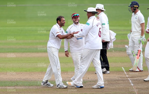 140917 - Glamorgan v Northamptonshire - Specsavers County Championship - Division Two - Azharullah of Northants celebrates with team mates celebrates bowling Kiran Carlson of Glamorgan