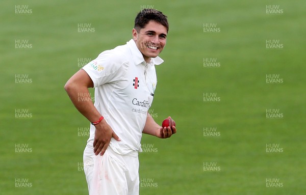 030417 - Glamorgan v Nottinghamshire - Pre Season Friendly - Kiran Carlson of Glamorgan bowling