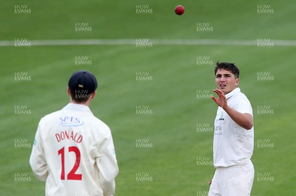 030417 - Glamorgan v Nottinghamshire - Pre Season Friendly - Kiran Carlson of Glamorgan bowling