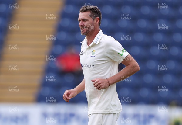 120722 - Glamorgan v Nottinghamshire - LV= County Championship Division Two - Michael Hogan of Glamorgan celebrates after Joey Evison is caught by Chris Cooke