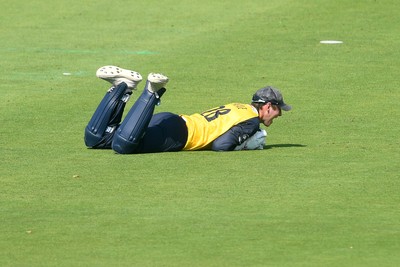 170825 - Glamorgan v Nottinghamshire - Metro Bank One Day Cup - Will Smale of Glamorgan catches the ball to dismiss Ben Martindale of Nottinghamshire