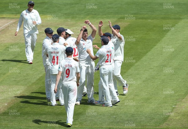 190517 - Glamorgan v Nottinghamshire, Specsavers County Championship - Glamorgan players celebrate after taking the wicket of Cheteshwar Pujara of Nottinghamshire