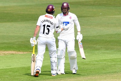 080526 - Glamorgan v Somerset - Rothesay County Championship -  Josh Thomas of Somerset is congratulated by teammate Tom Lammonby after hitting 50