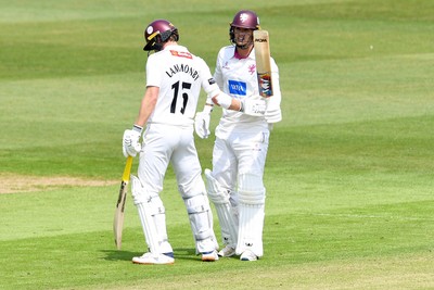 080526 - Glamorgan v Somerset - Rothesay County Championship -  Josh Thomas of Somerset is congratulated by teammate Tom Lammonby after hitting 50