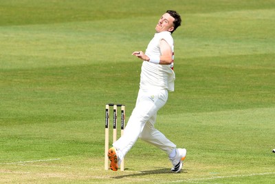 080526 - Glamorgan v Somerset - Rothesay County Championship -  Ryan Hadley of Glamorgan bowls the ball to dismiss Josh Thomas of Somerset