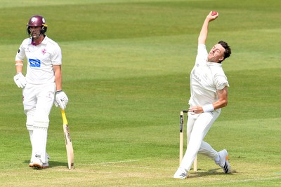 080526 - Glamorgan v Somerset - Rothesay County Championship -  Ryan Hadley of Glamorgan bowls the ball to dismiss Josh Thomas of Somerset
