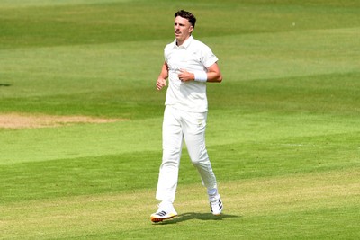 080526 - Glamorgan v Somerset - Rothesay County Championship -  Ryan Hadley of Glamorgan bowls the ball to dismiss Josh Thomas of Somerset