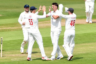 080526 - Glamorgan v Somerset - Rothesay County Championship -  Ryan Hadley of Glamorgan bowls the ball to dismiss Josh Thomas of Somerset