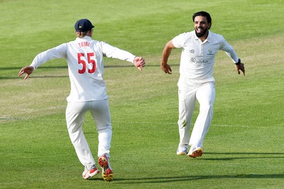 080526 - Glamorgan v Somerset - Rothesay County Championship -  Asa Tribe of Glamorgan celebrates with Zain Ul Hassan after catching the ball to dismiss Lewis Gregory of Somerset